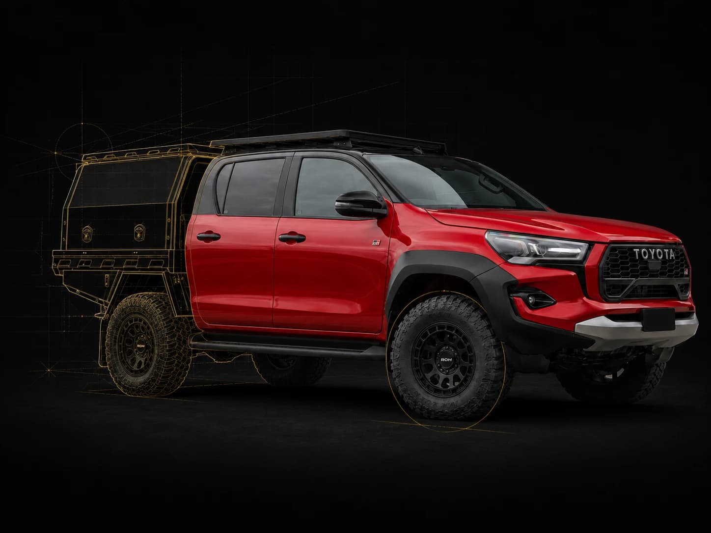 Red Toyota GR Hilux with aftermarket wheels, tyres, a roof rack and MITS Alloy canopy, with yellow technical outlines highlighting the build details.